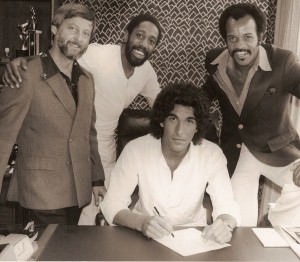 Jay Lowry, Carl Griffin, Robert Gordy, and me, signing the Motown deal
