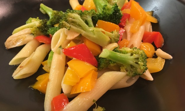 Slim Man Cooks Broccoli and Peppers