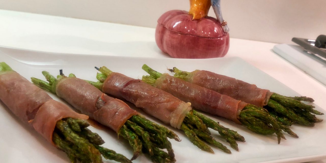 Slim Man Cooks Baked Asparagus Wrapped in Prosciutto